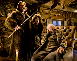 (L-R) KURT RUSSELL, JENNIFER JASON LEIGH, and BRUCE DERN star in THE HATEFUL EIGHT. Photo: Andrew Cooper, SMPSP © 2015 The Weinstein Company. All Rights Reserved. 